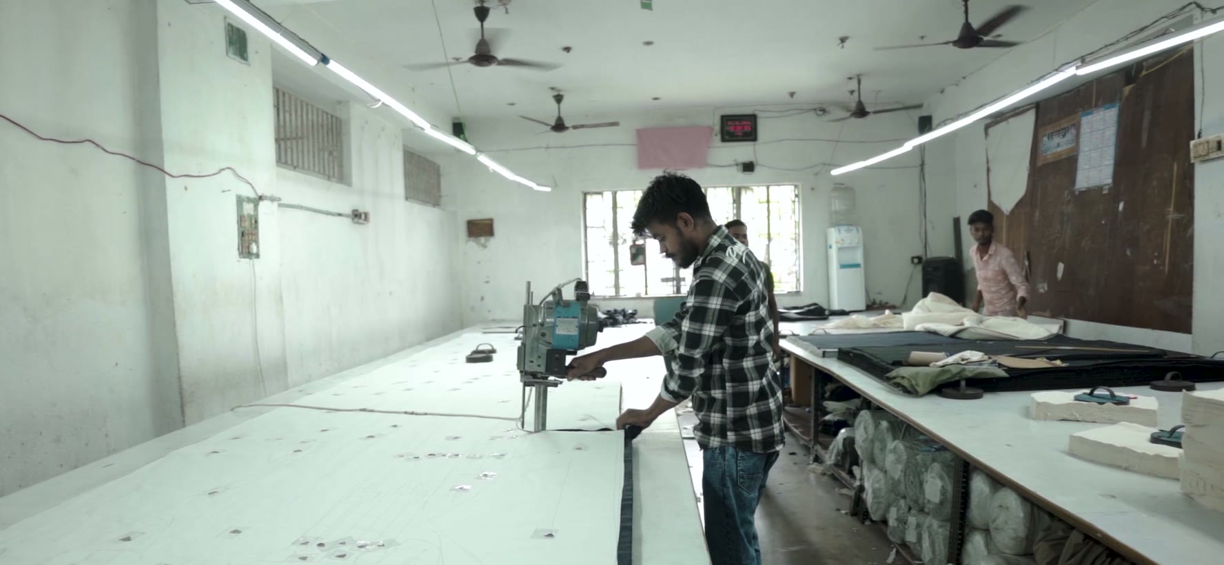 Denim laid up the length of the cutting table